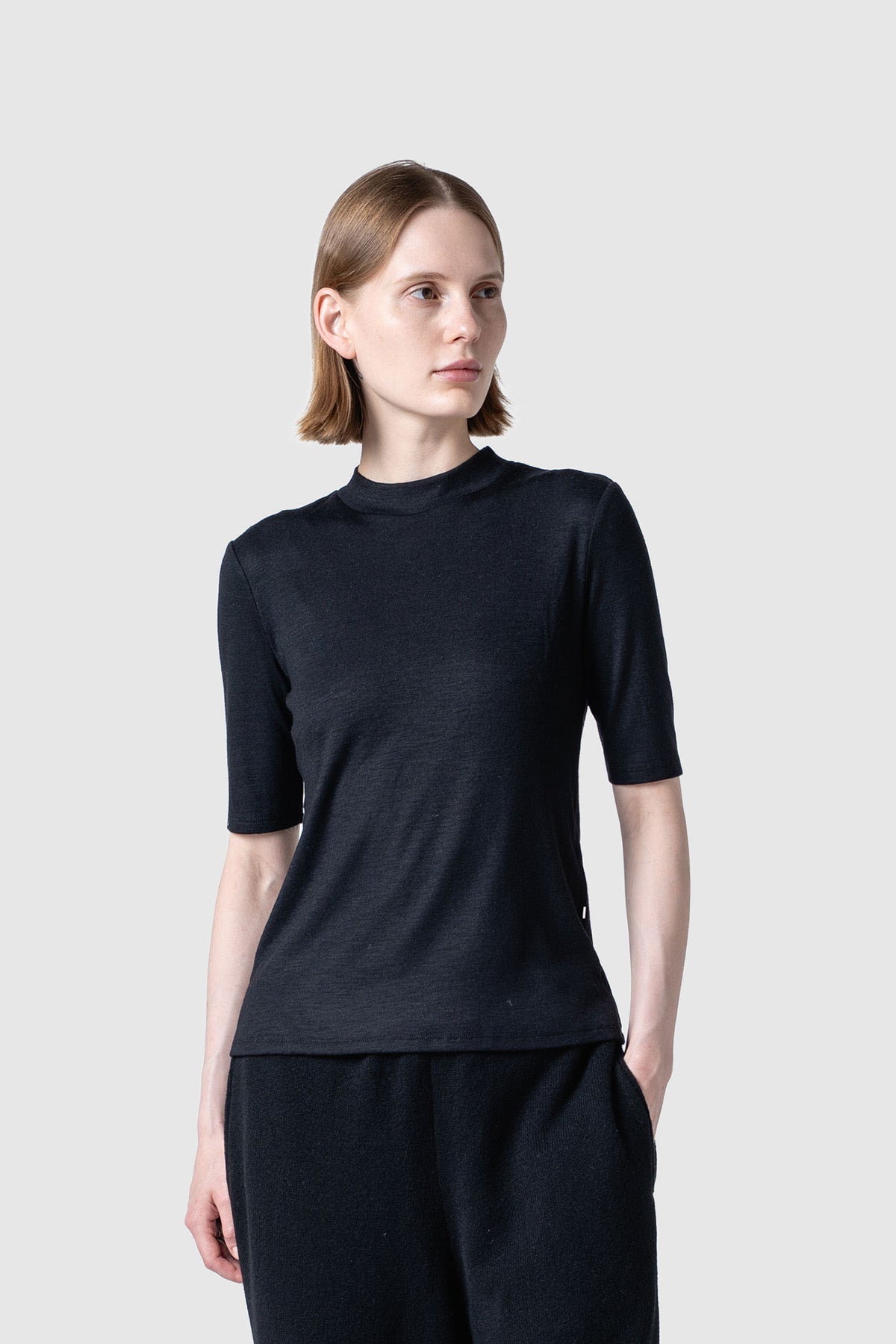 WOOL SHEER JERSEY BOTTLE NECK TOP